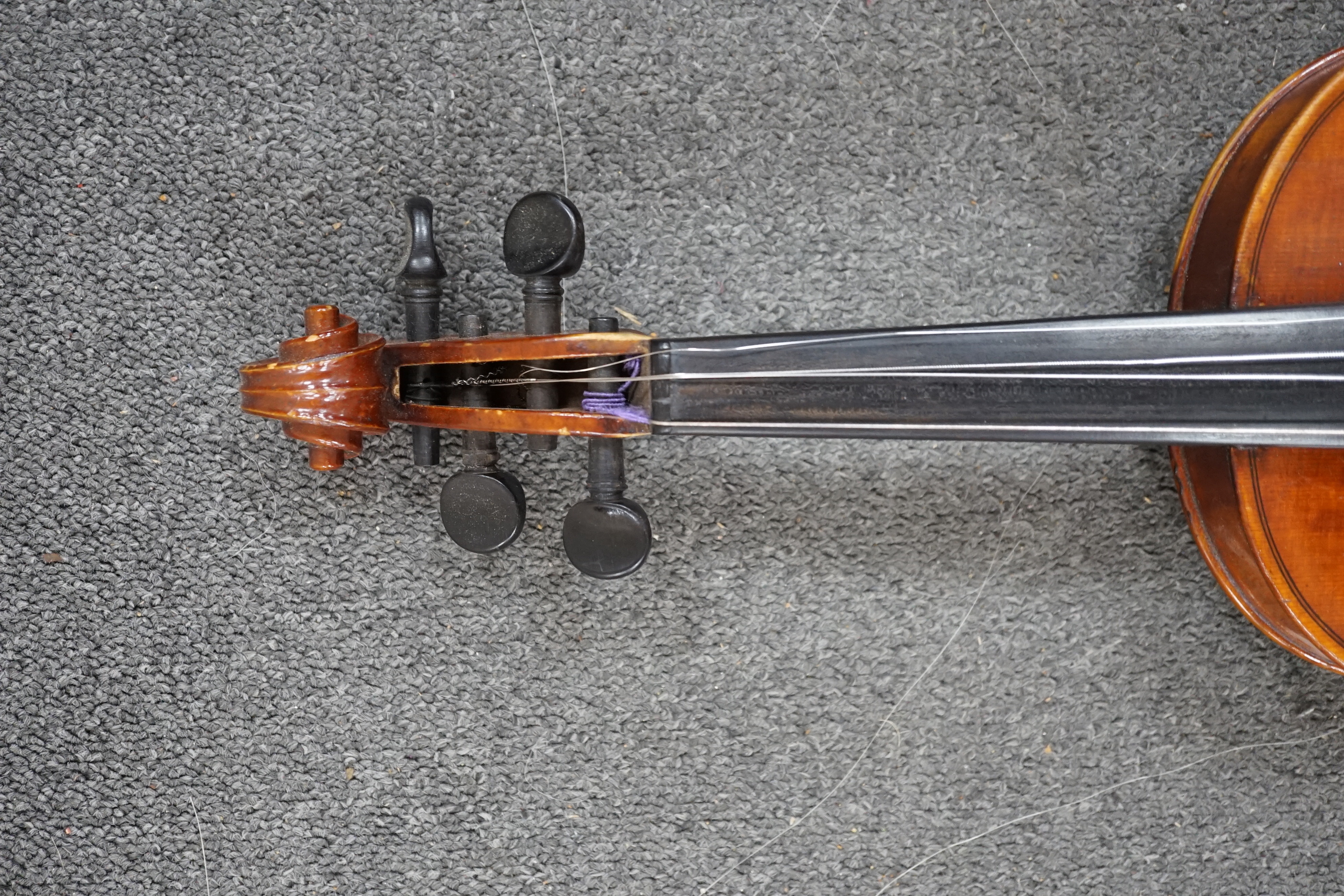 A 19th century violin with silver mounted bow and case, back measures 36cm CITES Submission reference JX7RJU7S